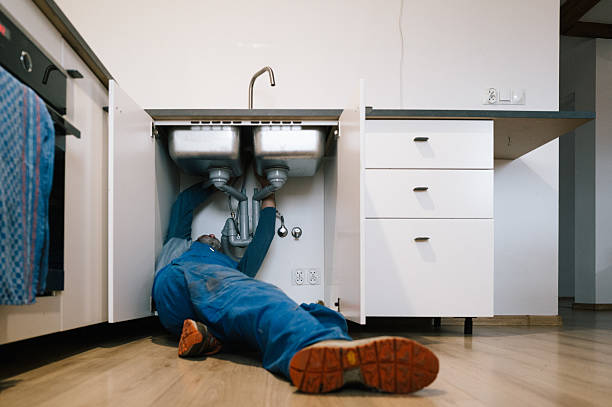 Professional Drain Cleaning technician working in Kingston, NH